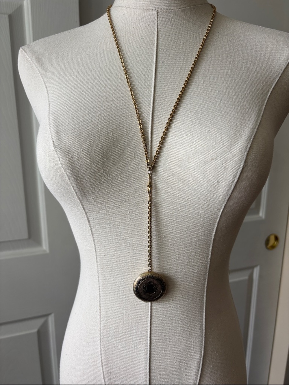 1928 Gold-Tone Locket Drop Necklace 27”
